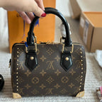 Rivet Hand-Held Pillow Bag